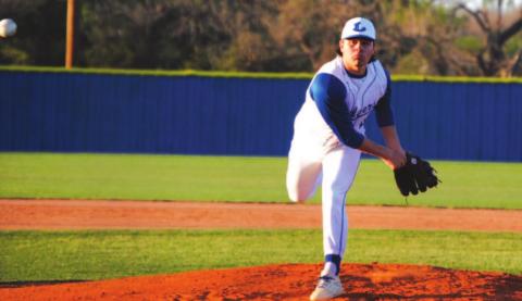 Tak Stinnett lets a pitch go during his complete game shutout of Brownwood earlier this season. HUNTER KING | DISPATCH RECORD
