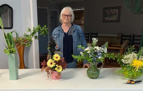 Teresa Stewart gave the members of the L-M Garden and Civic Club many suggestions and ideas for arrangement entries in the upcoming flower show. COURTESY PHOTO
