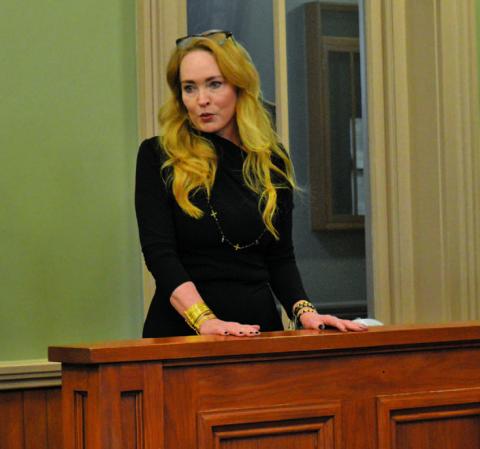 Michelle Wittenburg provides county officials with her career summary during Monday’s Lampasas County Commissioners Court meeting. The court approved a contract agreement with Wittenburg to provide lobbying services for the county. EERICK MITCHELL | DISPATCH RECORD