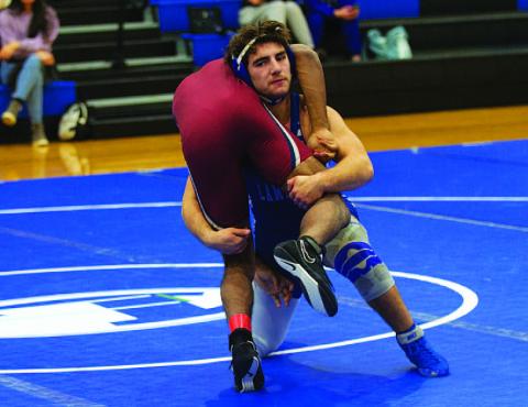Daemian Rivas pinned his opponent to pick up his 50th career win as a Badger. HUNTER KING | DISPATCH RECORD