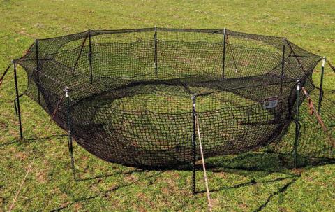 Paul Holland with the Hill Country Soil &amp; Water Conservation District says the hog traps are easy to set up and simple to operate. Landowners simply need to supply bait corn to lure wild pigs into the trap. The trap system may be leased for up to 60 days. COURTESY PHOTO