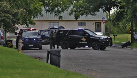 Texas Department of Public Safety vehicles park on West Avenue A near Arnold Street during a standoff with a perpetrator responsible for shooting two Lampasas women, then later himself, on Thursday. ERICK MITCHELL | DISPATCH RECORD