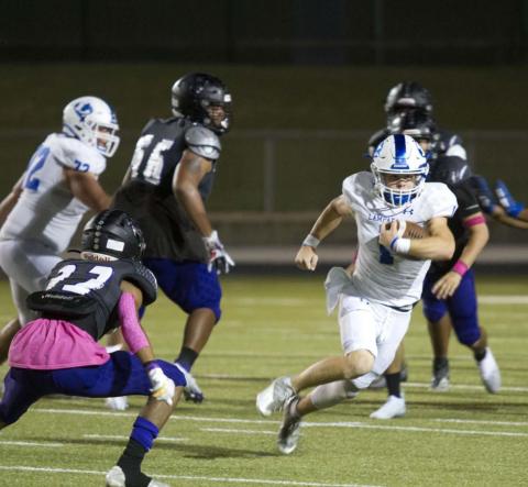 Luke Smith attempts to make an LBJ defender miss during a game earlier this season. HUNTER KING | DISPATCH RECORD