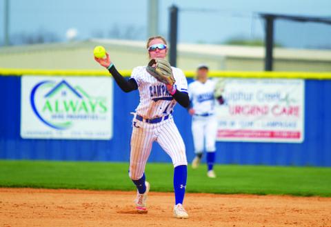 Aspen Wheeler throws across to first base from her shortstop position after fielding a ground ball. HUNTER KING | DISPATCH RECORD