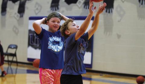 HUNTER KING | DISPATCH RECORD Ayson Nuckles shoots at basketball camp.