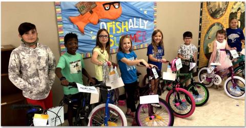 Second-semester and all-year Perfect Attendance Award recipients had their names entered into a drawing for a bicycle. Bicycle winners, pictured left to right, are Colt Wilson, Alexander Martin, Allie Weinheimer, Amy Weinheimer, Taylor Creek, Alex Torrez, Kylie Davis and Kayleigh Harper. COURTESY PHOTO