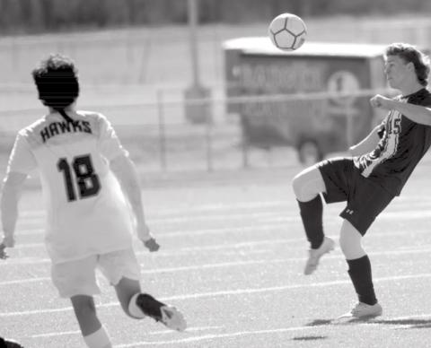 Nate Abken (15) moves the ball in a recent game. JEFF LOWE | DISPATCH RECORD