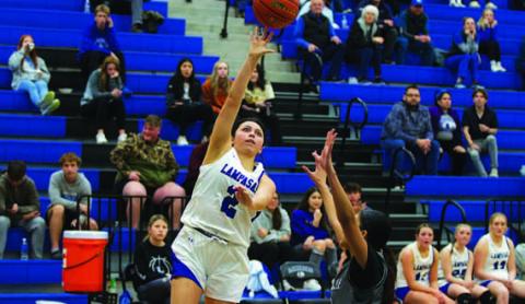 Johnnie Lewis shoots over a Gatesville defender. HUNTER KING | DISPATCH RECORD