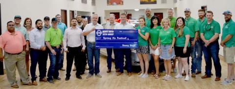 Auto deadership makes donation to Spring Ho Committee