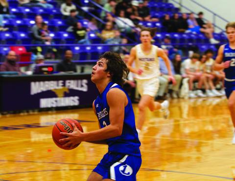AJ Rosales scored nine points last Friday, the second-leading scorer on the night. HUNTER KING | DISPATCH RECORD