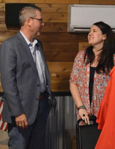 District 54 State Rep. Brad Buckley chats with Natalie Wallace Bennett during a visit to Lampasas on Thursday. MADELEINE MILLER | DISPATCH RECORD