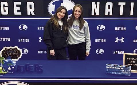 Gracey Ullevig, left, and Hannah Perry both signed last Friday to continue their athletic careers at the college level. Ullevig will be playing volleyball at Temple College, and Perry is going to play softball at Wayland Baptist University. COURTESY PHOTO