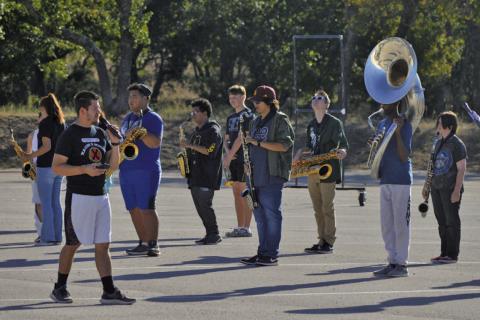 Lampasas High School band director Eduardo Zambrano leads the Badger Band through marching practice earlier this fall. Nineteen LHS band students earned All-Region honors. ERICK MITCHELL | DISPATCH RECORD