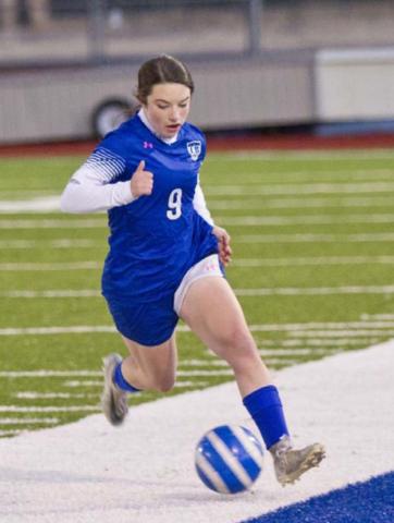 Bella Lindsey, shown in action earlier last week, scored four goals in a scrimmage Friday against Rockdale. JEFF LOWE | DISPATCH RECORD