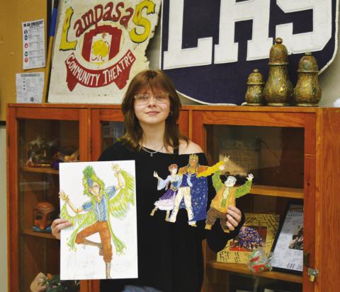 LHS sophomore Kayla Crowe reveals her costume designs for UIL’s Theatrical Design state competition. Unlike some competitors who use digital tools, Crowe’s designs are all old-school, hand-crafted items. ERICK MITCHELL | DISPATCH RECORD