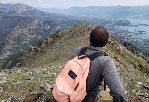 Chris Murrell takes in the view from the ridge line of Peak One in Summit County, Colorado. ALEXANDRIA RANDOLPH MURRELL | COURTESY PHOTO