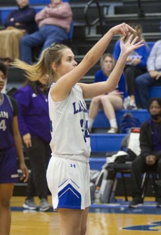 Jamie Ball follows through on a free-throw attempt. HUNTER KING | DISPATCH RECORD