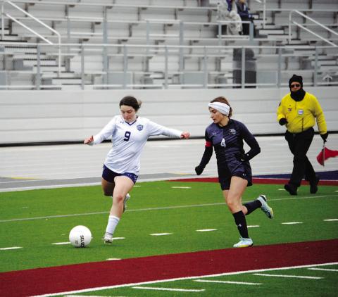 Bella Lindsey prepares to make a pass. The junior will be a leader for the Lady Badgers this season. HUNTER KING | DISPATCH RECORD