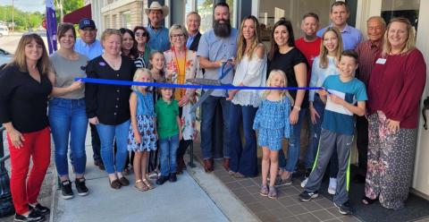 Downtown real estate office celebrates with a ribbon-cutting event