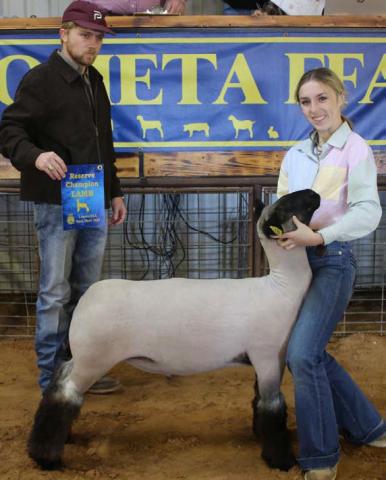 Kynslee Cody exhibited the grand champion market lamb. MASON HINES | DISPATCH RECORD