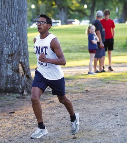 HUNTER KING | DISPATCH RECORD Zimri Vergara was the first-place finisher in the 1-mile race on Saturday.