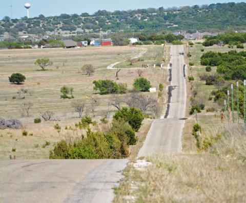 COURTESY PHOTO Portions of County Road 3300 lie in both Precinct 4 and Precinct 1, and it is the most heavily traveled road in Precinct 1, Commissioner Bobby Carroll said.