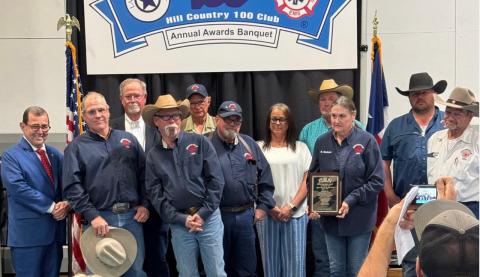 COURTESY PHOTO The Adamsville Volunteer Fire Department was honored by the Hill Country 100 Club for its actions on May 4-5, 2024 to keep area residents safe during widespread flooding when the Lampasas River left its banks. Pictured with the Adamsville VFD is State Sen. Pete Flores, at left.