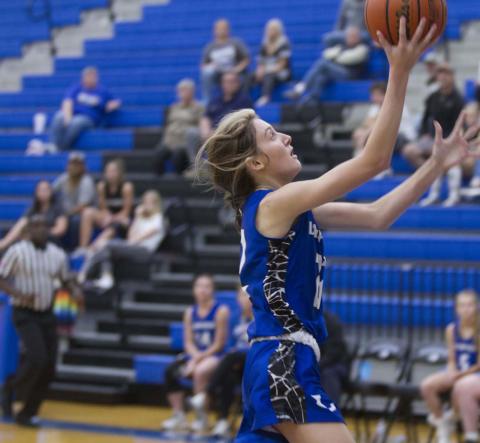 Junior Payton Tatum goes up for a layup during the Lady Badgers’ scrimmage against Lake Belton on Tuesday. HUNTER KING | DISPATCH RECORD