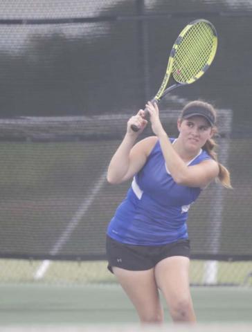 Klair Clements follows through on a backhand shot during her doubles match against Copperas Cove. HUNTER KING | DISPATCH RECORD