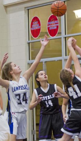 Lady Badger freshman Jamie Ball (34) goes for a defensive rebound in the Lady Badgers’ third straight win. JEFF LOWE | DISPATCH RECORD