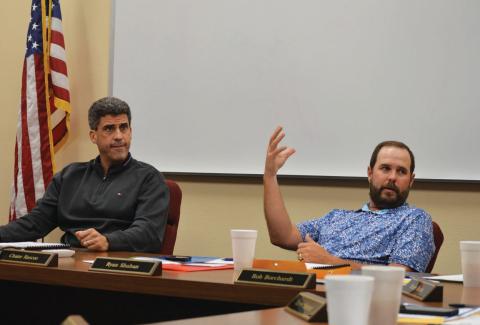 erick mitchell | dispatc h record Superintendent Dr. Chane Rascoe, left, and Lampasas ISD Board President Ryan Shahan discuss with trustees what they want to see with design plans from WRA Architects.