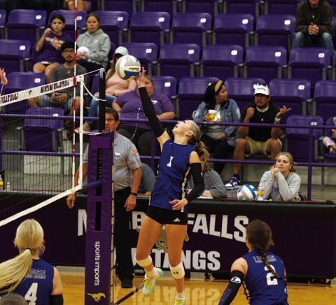 HUNTER KING | DISPATCH RECORD Brailey Wilson leaps and reaches to tap the ball over the net during the Lady Badgers’ match against Marble Falls on Tuesday. She will play her final match tonight in Salado.
