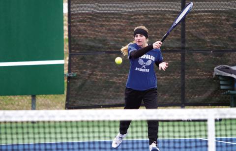 HUNTER KING | DISPATCH RECORD Loretta Hodges swings through a forehand shot during the tournament last Friday afternoon.