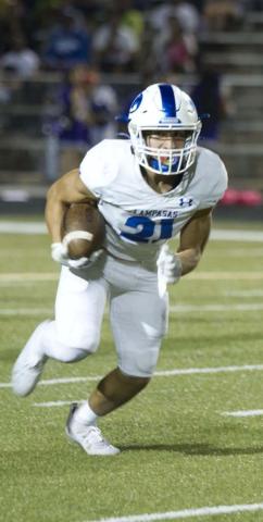 Ethan Moreno runs in the open field during the Badgers’ game against LBJ last week. HUNTER KING | DISPATCH RECORD