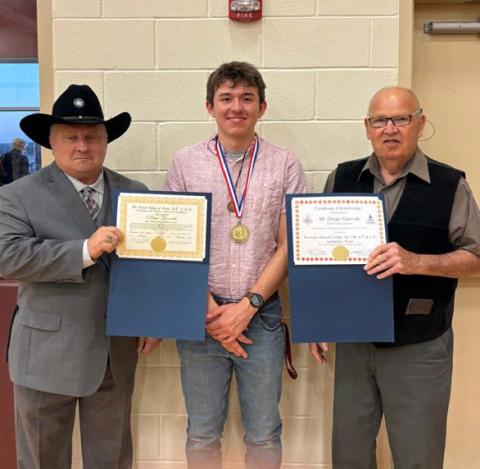 Members of Saratoga Masonic Lodge #546 were in Lometa this week to present annual awards to its honorees in the school district. Saratoga Lodge representatives Paul Plourde, at left, and Bob Caughron, right, are pictured with Lamar Medal student recipient Diego Garrido, who also earned a $1,000 scholarship with this award. courtesy photo
