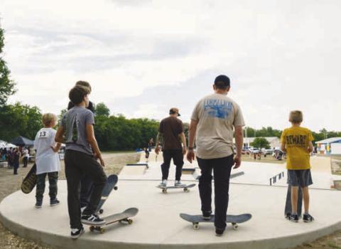 ADAM BARRIOS | DISPATCH RECORD Skaters wait for their chance to perform a trick.