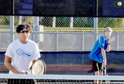 James Vasquez, left, and Luke Rogers compete in doubles on Thursday. KENNETH PEISER | COURTESY PHOTO
