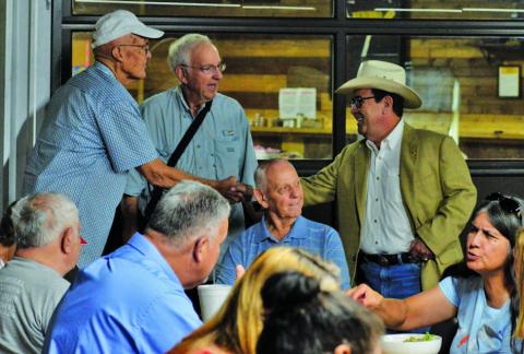 ERICK MITCHELL | DISPATCH RECORD State Senator Pete Flores (R-Pleasanton), at right, visits with Lampasas County residents before speaking at Thursday’s local Republican Party gathering.