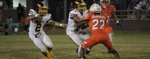 Tim Juarez runs past a Rotan defender while Luis Hernandez lays a block during the Hornets’ win last Friday. JESSICA MALDONADO | DISPATCH RECORD
