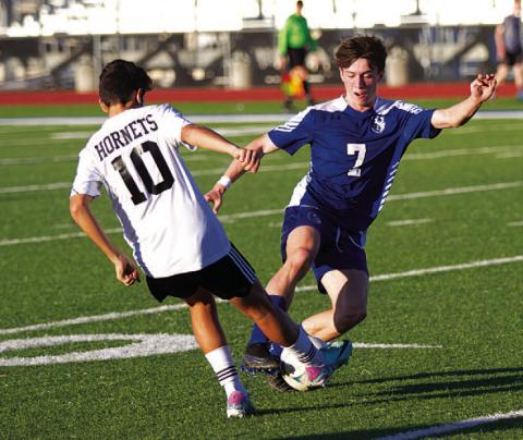 Cooper Pfaltzgraff dribbles around a Gatesville player during last Friday’s match. HUNTER KING | DISPATCH RECORD