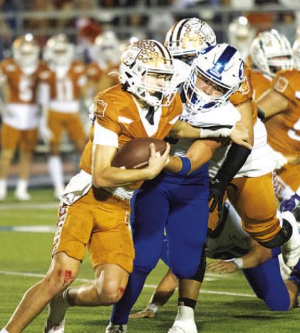 Raider Morua makes a tackle for loss against Alice last week. HUNTER KING | DISPATCH RECORD
