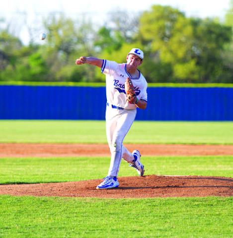 HUNTER KING | DISPATCH RECORD Calvin Phelps releases a pitch early in his outing against Marble Falls on Tuesday.