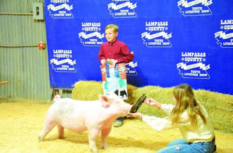Holt Bumpas claimed the Junior Showmanship title for market swine exhibitors. HUNTER KING | DISPATCH RECORD