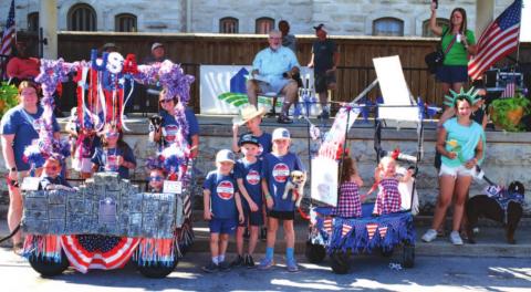 Theme winners for the Pet Parade were announced: first place, Marlee, Chett and Ky with Dixie, Harvey and June; second, a float titled “Let Cousins Spring”; and third, Brodie with dog Avery. They are pictured here left to right. MASON HINES | DISPATCH RECORD