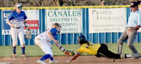 Aspen Wheeler lays down a tag, while Autumn Beisel-Macomber backs her up on the play. CHRIS YBARRA | DISPATCH RECORD