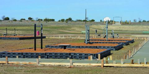 Completion of the workout stations at the FM 580 Sports Park nears its end on Tuesday afternoon. ERICK MITCHELL | DISPATCH RECORD