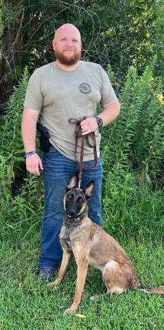 Lampasas County Sheriff’s Office Deputy C.J. Faubion poses with K-9 Officer Blazer. courtesy photo