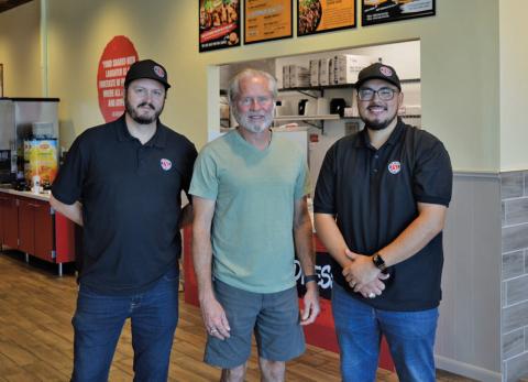M 5 Enterprise executives, from left, Ben Hagan, John Hagan and Edgar Solis pose for a photo in front of the counter at Lampasas’ newest fast-casual dining restaurant, Teriyaki Madness. The restaurant is located next door to M 5’s Golden Chick franchise at 1702 Central Texas Expressway and is open seven days a week from 10 a.m. to 9 p.m. erick Mitchell | dispatch record