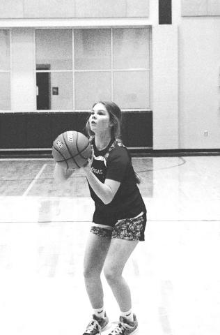 Addison Borchardt sets to release a three-point shot. HUNTER KING | DISPATCH RECORD