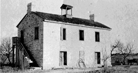 The college building was a two-story limestone structure that stood southeast of the public square, near Sulphur Creek. COURTESY PHOTO